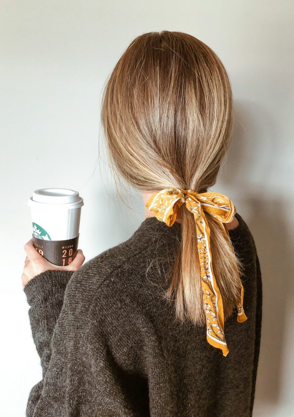 Girl with a ribbon in her hair.