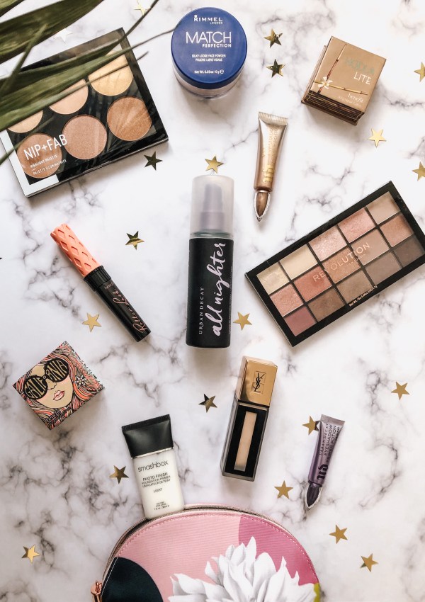 Makeup bag and scattering of makeup products.